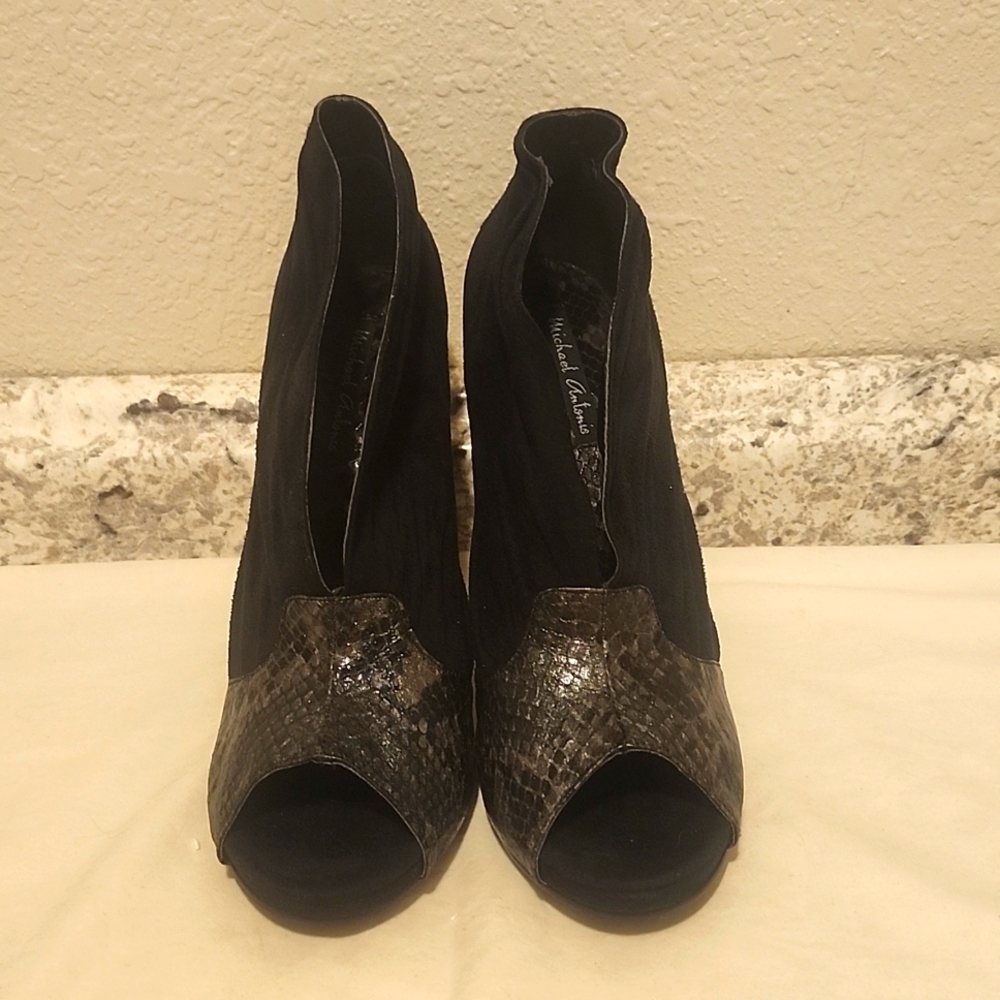 Micheal Antonio heels.   Box 8